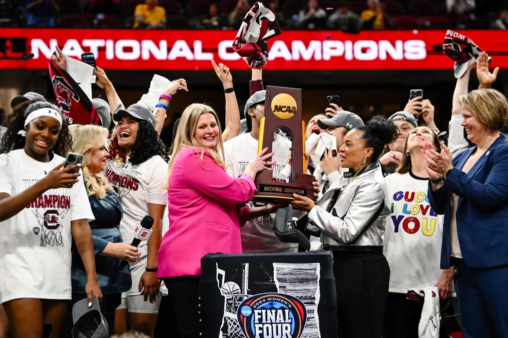 Staley and the Gamecocks receive the trophy on court for the third time in program history