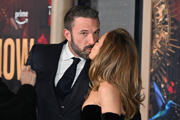 US actress Jennifer Lopez ( and US actor Ben Affleck kiss as they attend Amazon's 