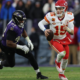 BALTIMORE, MARYLAND - JANUARY 28: Patrick Mahomes #15 of the Kansas City Chiefs rushes with the ball against the Baltimore Ravens in the AFC Championship Game at M&T Bank Stadium on January 28, 2024 in Baltimore, Maryland.