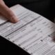 A voter registration card in 2022. The deadline to register to vote in this year's elections is Oct. 7. (May-Ying Lam For The Texas Tribune, May-Ying Lam For The Texas Tribune)