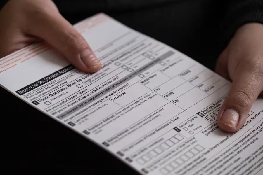 A voter registration card in 2022. The deadline to register to vote in this year's elections is Oct. 7. (May-Ying Lam For The Texas Tribune, May-Ying Lam For The Texas Tribune)