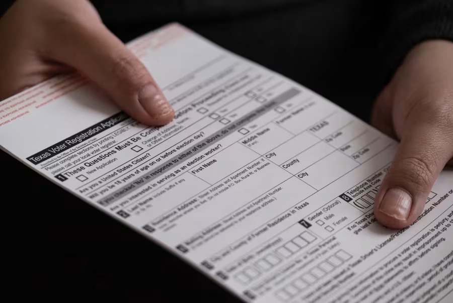 A voter registration card in 2022. The deadline to register to vote in this year's elections is Oct. 7. (May-Ying Lam For The Texas Tribune, May-Ying Lam For The Texas Tribune)