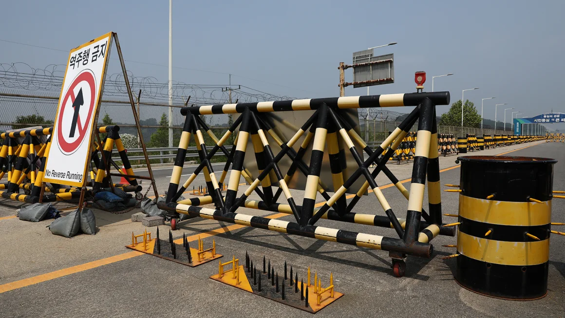 Barricades are placed near the Unification Bridge leading to Panmunjom in the Demilitarized Zone (DMZ) on June 11, 2024 in Paju, South Korea. Chung Sung-Jun/Getty Images